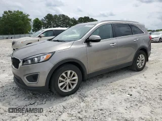 2018 Kia Sorento LX z VIN 5XYPG4A31JG406679, wystawiony jako Copart lot #55087315 z przebiegiem 146 171 mil mil oraz Szkoda całkowita • Salvage title. Historia ofert i sprzedaży dostępna na DreamBid. Obrazek 1.