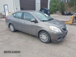 2012 Nissan Versa SV with VIN 3N1CN7AP2CL860205, listed as a IAAI auction lot 42148784 with 185,019 mi miles. Bid and sale history available at carsss.com. Image 1.