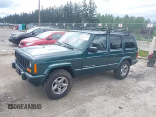 1999 Jeep Cherokee Sport with VIN 1J4FF68S5XL677243, listed as a IAAI auction lot 42221329 with 293,808 mi miles and . Bid and sale history available at DreamBid. Image 2.