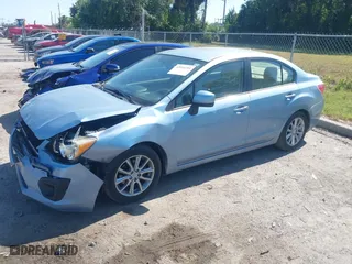 2012 Subaru Impreza Sedan 2.0i Premium with VIN JF1GJAC64CH017848, listed as a IAAI auction lot 42054205 with 169,906 mi miles. Bid and sale history available at carsss.com. Image 2.