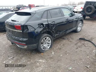 2023 Volkswagen Atlas SE z VIN 1V2HE2CA1PC210232, wystawiony jako IAAI lot #40966039 z przebiegiem 4 064 mil mil oraz . Historia ofert i sprzedaży dostępna na DreamBid. Obrazek 4.