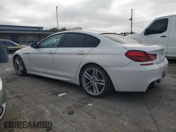 2017 BMW 6 Series 650i with VIN WBA6D4C54HD977706, listed as a Copart auction lot 79116554 with 87,039 mi miles and Salvage Title. Bid and sale history available at carsss.com. Image 2.