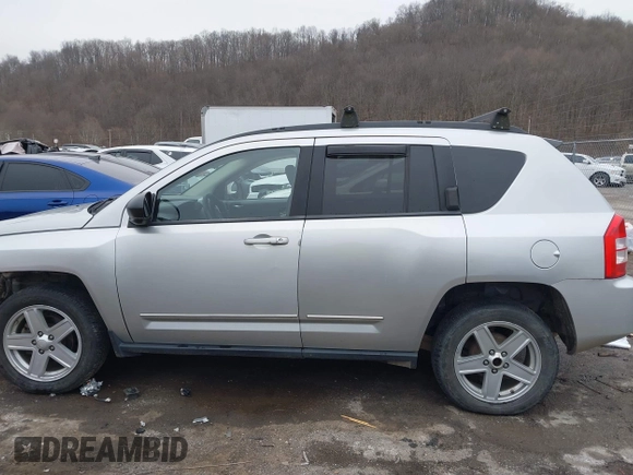 2008 Jeep Compass Sport with VIN 1J8FT47078D755562, listed as a IAAI auction lot 41493097 with 120,502 mi miles. Bid and sale history available at carsss.com. Image 14.