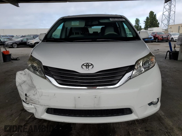 2012 Toyota Sienna XLE AAS with VIN 5TDYK3DC7CS275496, listed as a Copart auction lot 62612815 with 130,027 mi miles and Salvage title. Bid and sale history available at DreamBid. Image 5.