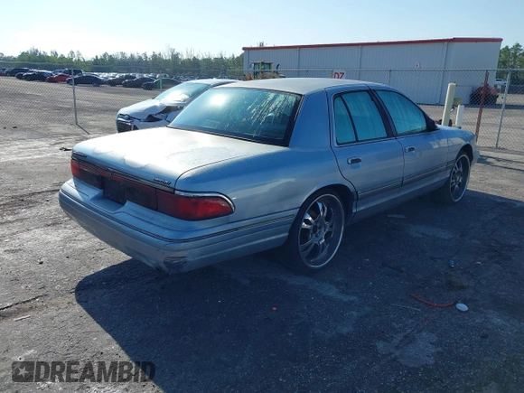 1997 Mercury Grand Marquis LS with VIN 2MELM75W7VX708034, listed as a IAAI auction lot 41878938 with 197,818 mi miles and . Bid and sale history available at DreamBid. Image 4.