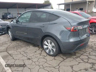 2022 Tesla Model Y Long Range with VIN 7SAYGDEE8NF317482, listed as a IAAI auction lot 41806043 with 32,108 mi miles and . Bid and sale history available at carsss.com. Image 3.