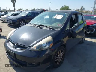 2007 Honda Fit Sport with VIN JHMGD37637S005754, listed as a IAAI auction lot 42663714 with 239,000 mi miles and . Bid and sale history available at DreamBid. Image 2.