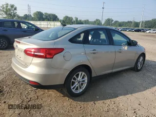 2015 Ford Focus SE with VIN 1FADP3F22FL383928, listed as a Copart auction lot 64835175 with 77,594 mi miles and Clean title. Bid and sale history available at DreamBid. Image 3.