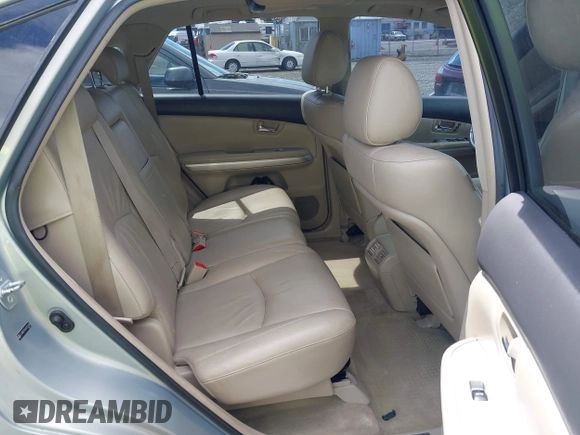 2006 Lexus RX 400h z VIN JTJHW31U860010706, wystawiony jako IAAI lot #42286504 z przebiegiem 220 671 mil mil oraz . Historia ofert i sprzedaży dostępna na DreamBid. Obrazek 8.