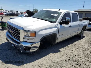 2015 GMC Sierra 2500HD SLT z VIN 1GT12ZE83FF121256, wystawiony jako Copart lot #53985215 z przebiegiem 241 326 mil mil oraz Szkoda całkowita • Salvage title. Historia ofert i sprzedaży dostępna na DreamBid. Obrazek 1.