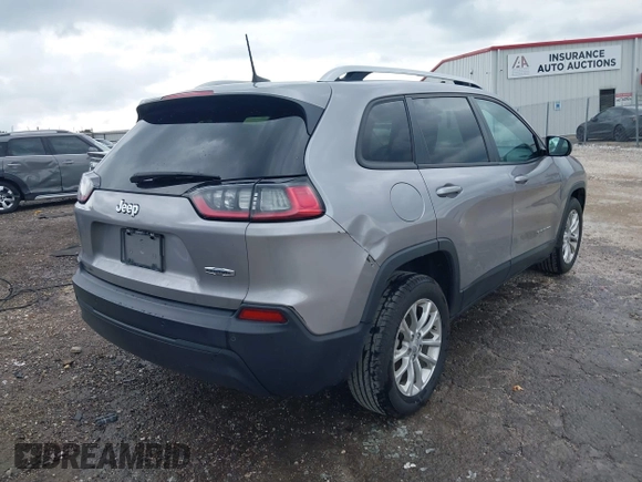 2020 Jeep Cherokee Latitude with VIN 1C4PJLCBXLD637338, listed as a IAAI auction lot 42471556 with 69,191 mi miles and . Bid and sale history available at DreamBid. Image 4.