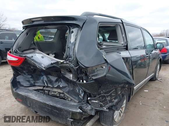 2016 Toyota Sienna XLE with VIN 5TDYK3DC8GS718289, listed as a IAAI auction lot 41774375 with 154,067 mi miles. Bid and sale history available at carsss.com. Image 4.