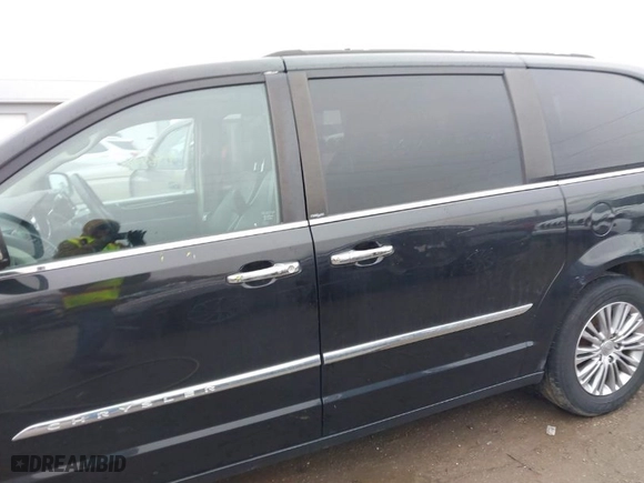 2013 Chrysler Town & Country Touring-L with VIN 2C4RC1CG8DR809559, listed as a IAAI auction lot 41468926 with 182,236 mi miles. Bid and sale history available at carsss.com. Image 15.