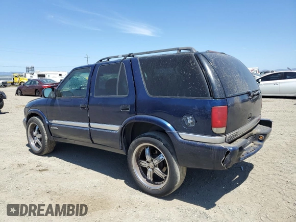 2001 GMC Jimmy SLE Rental Fleet z VIN 1GKDT13W212108144, wystawiony jako Copart lot #58753865 z przebiegiem 254 402 mil mil oraz Szkoda całkowita • Salvage title. Historia ofert i sprzedaży dostępna na DreamBid. Obrazek 2.