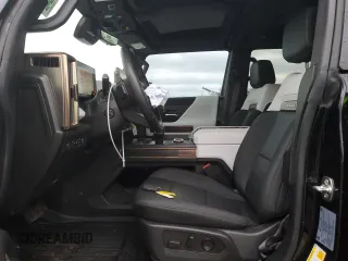 2024 GMC Hummer EV 2X with VIN 1GKB0NDE4RU104402, listed as a Copart auction lot 50191545 with 15,506 mi miles and Salvage Title. Bid and sale history available at carsss.com. Image 7.