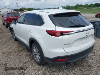 2016 Mazda CX-9 Sport with VIN JM3TCABY4G0100620, listed as a IAAI auction lot 42316216 with 191,245 mi miles and . Bid and sale history available at DreamBid. Image 3.