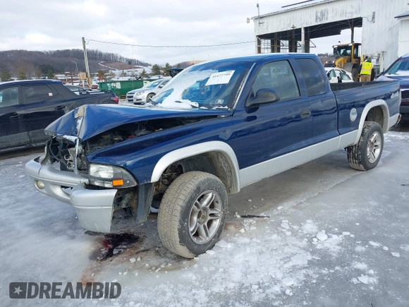 2004 Dodge Dakota SLT with VIN 1D7HG42N74S665198, listed as a IAAI auction lot 41477799 with 213,175 mi miles. Bid and sale history available at carsss.com. Image 2.