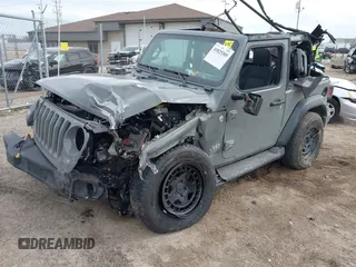 2018 Jeep Wrangler Sport S with VIN 1C4GJXAGXJW197483, listed as a IAAI auction lot 41825305 with 64,173 mi miles and . Bid and sale history available at DreamBid. Image 2.