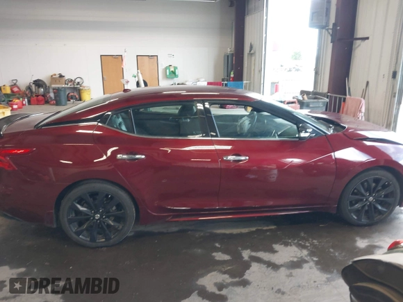 2017 Nissan Maxima SV z VIN 1N4AA6AP9HC416595, wystawiony jako IAAI lot #42385192 z przebiegiem 73 135 mil mil oraz . Historia ofert i sprzedaży dostępna na DreamBid. Obrazek 13.