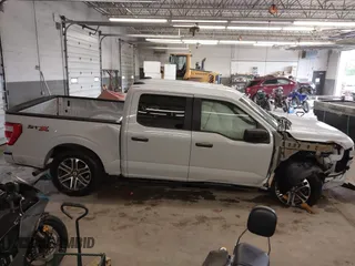 2021 Ford F-150 XL with VIN 1FTEW1CP9MKE41204, listed as a IAAI auction lot 42314231 with 59,959 mi miles and . Bid and sale history available at DreamBid. Image 14.