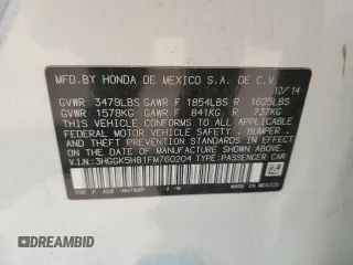 2015 Honda Fit EX-L z VIN 3HGGK5H81FM760204, wystawiony jako Copart lot #56827025 z przebiegiem 125 962 mil mil oraz Szkoda całkowita • Salvage title. Historia ofert i sprzedaży dostępna na DreamBid. Obrazek 12.