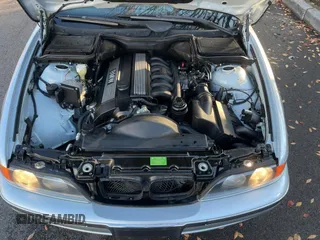 1997 BMW 5 Series 528iA with VIN WBADD6324VBW20221, listed as a Copart auction lot 82865794 with 74,647 mi miles and Clean Title. Bid and sale history available at carsss.com. Image 7.