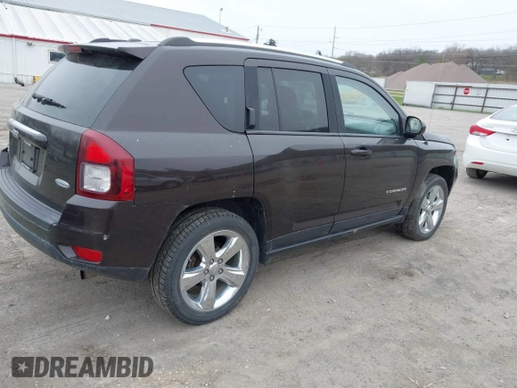 2014 Jeep Compass Latitude with VIN 1C4NJDEB5ED731057, listed as a IAAI auction lot 41938769 with 175,289 mi miles and . Bid and sale history available at carsss.com. Image 4.