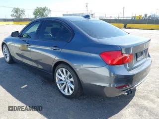 2012 BMW 3 Series 328i with VIN WBA3A5C5XCF342956, listed as a IAAI auction lot 42167647 with 154,972 mi miles and . Bid and sale history available at carsss.com. Image 3.