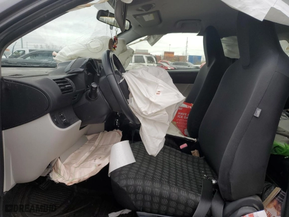 2012 Scion iQ with VIN JTNJJXB09CJ017607, listed as a Copart auction lot 81071054 with 0 mi miles and Salvage Title. Bid and sale history available at carsss.com. Image 7.