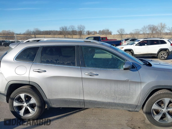2019 Jeep Cherokee Limited with VIN 1C4PJMDN0KD180598, listed as a IAAI auction lot 41433530 with 137,398 mi miles. Bid and sale history available at carsss.com. Image 14.