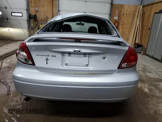 2004 Ford Taurus SE with VIN 1FAFP53224G175353, listed as a Copart auction lot 52713935 with 213,375 mi miles and Salvage Title. Bid and sale history available at DreamBid. Image 6.