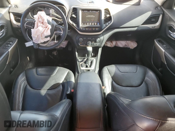 2018 Jeep Cherokee Limited z VIN 1C4PJLDX7JD573718, wystawiony jako Copart lot #83295024 z przebiegiem 102 479 mil mil oraz Nie do naprawy • Non repairable. Historia ofert i sprzedaży dostępna na DreamBid. Obrazek 8.