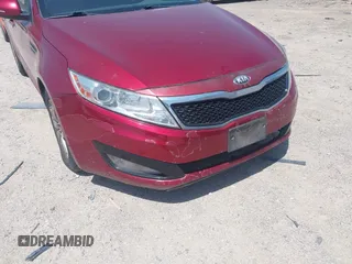2013 Kia Optima LX with VIN 5XXGM4A7XDG247696, listed as a IAAI auction lot 42013026 with 119,209 mi miles. Bid and sale history available at carsss.com. Image 6.