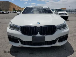 2016 BMW 7 Series 750i z VIN WBA7F0C56GGL99130, wystawiony jako Copart lot #56972905 z przebiegiem 100 556 mil mil oraz Czysty tytuł • Clean title. Historia ofert i sprzedaży dostępna na DreamBid. Obrazek 5.