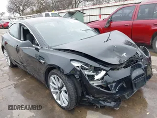 2018 Tesla Model 3 Long Range Battery with VIN 5YJ3E1EB3JF090567, listed as a IAAI auction lot 41568312 with 35,327 mi miles and . Bid and sale history available at DreamBid. Image 6.