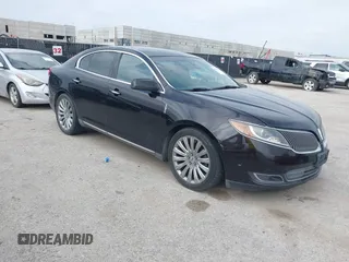 2013 Lincoln MKS with VIN 1LNHL9DK1DG608872, listed as a IAAI auction lot 42672243 with 175,935 mi miles and . Bid and sale history available at DreamBid. Image 1.