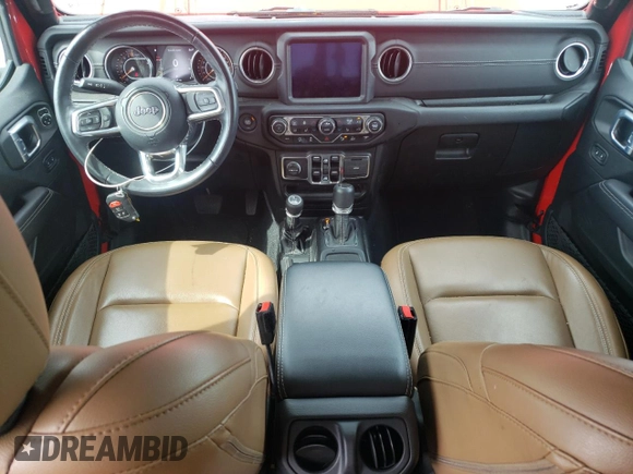 2021 Jeep Gladiator High Altitude z VIN 1C6HJTFG4ML579074, wystawiony jako Copart lot #57145415 z przebiegiem 52 145 mil mil oraz Szkoda całkowita • Salvage title. Historia ofert i sprzedaży dostępna na DreamBid. Obrazek 8.