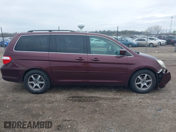 2007 Honda Odyssey Touring with VIN 5FNRL38847B048235, listed as a IAAI auction lot 41963652 with 176,412 mi miles. Bid and sale history available at carsss.com. Image 13.
