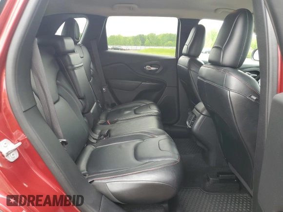 2014 Jeep Cherokee Trailhawk z VIN 1C4PJMBS2EW130125, wystawiony jako Copart lot #57830635 z przebiegiem 117 811 mil mil oraz Szkody całkowita. Historia ofert i sprzedaży dostępna na DreamBid. Obrazek 11.