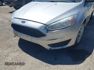 2016 Ford Focus SE with VIN 1FADP3F24GL286330, listed as a IAAI auction lot 42433516 with 130,814 mi miles and . Bid and sale history available at DreamBid. Image 6.