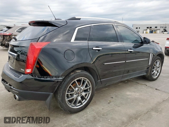 2015 Cadillac SRX Premium Collection z VIN 3GYFNDE33FS574125, wystawiony jako Copart lot #55530575 z przebiegiem 76 956 mil mil oraz Szkoda całkowita • Salvage title. Historia ofert i sprzedaży dostępna na DreamBid. Obrazek 3.