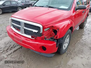 2006 Dodge Durango SLT z VIN 1D4HB48N06F135461, wystawiony jako IAAI lot #42330637 z przebiegiem 157 205 mil mil oraz . Historia ofert i sprzedaży dostępna na DreamBid. Obrazek 6.