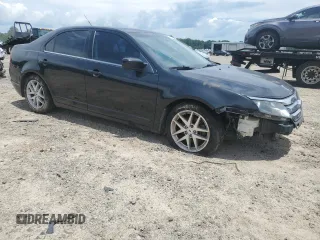2012 Ford Fusion SEL with VIN 3FAHP0JA9CR232709, listed as a Copart auction lot 63460785 with 187,263 mi miles and Salvage title. Bid and sale history available at DreamBid. Image 4.