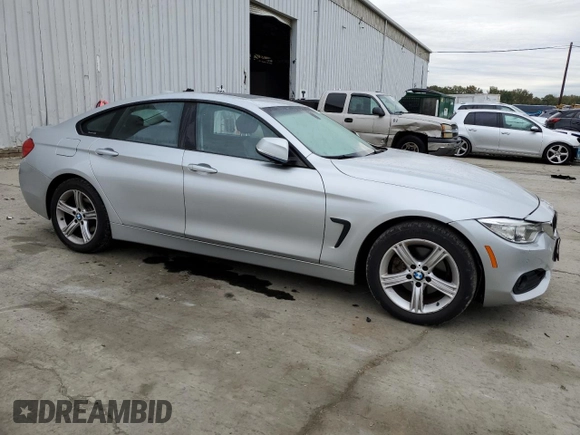 2015 BMW 4 Series 428i xDrive with VIN WBA4C9C5XFG135391, listed as a Copart auction lot 70753653 with 70,870 mi miles and . Bid and sale history available at DreamBid. Image 4.