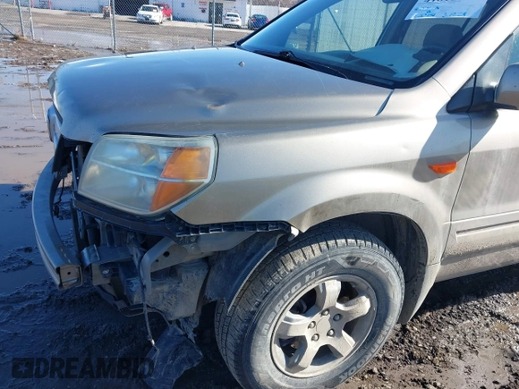 2007 Honda Pilot EX with VIN 2HKYF184X7H534943, listed as a IAAI auction lot 41818741 with 220,151 mi miles. Bid and sale history available at carsss.com. Image 12.