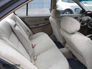 2000 Nissan Altima XE with VIN 1N4DL01D0YC181174, listed as a IAAI auction lot 41798721 with 119,682 mi miles. Bid and sale history available at carsss.com. Image 8.