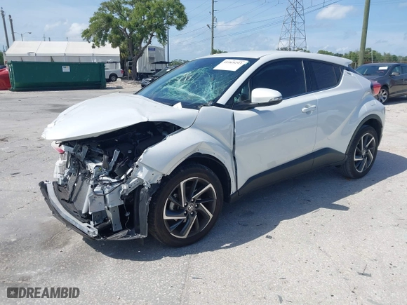 2022 Toyota C-HR XLE with VIN NMTKHMBX8NR147317, listed as a IAAI auction lot 41969293 with 11,621 mi miles. Bid and sale history available at carsss.com. Image 17.