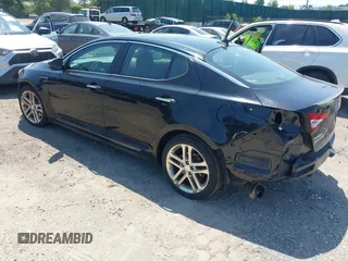 2013 Kia Optima SX with VIN 5XXGR4A67DG120512, listed as a IAAI auction lot 42585649 with 52,436 mi miles and . Bid and sale history available at DreamBid. Image 3.