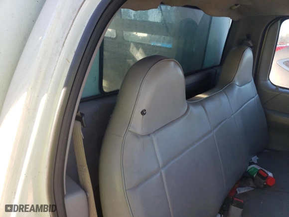 1999 Ford F-150 Work Series with VIN 1FTRF17W9XKB35000, listed as a Copart auction lot 86001964 with 155,055 mi miles and Salvage Title. Bid and sale history available at carsss.com. Image 10.