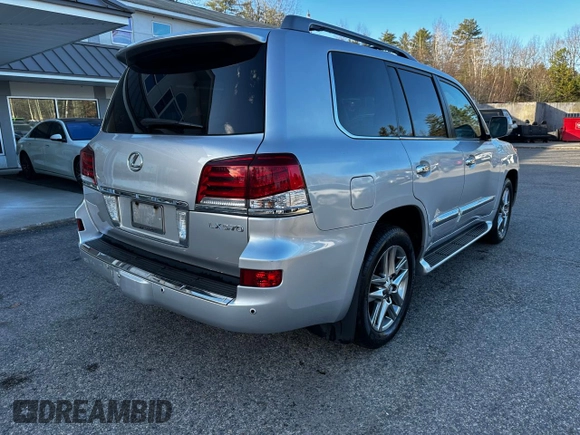 2013 Lexus LX 570 with VIN JTJHY7AXXD4091614, listed as a Copart auction lot 82096184 with 205,635 mi miles and Clean Title. Bid and sale history available at DreamBid. Image 4.